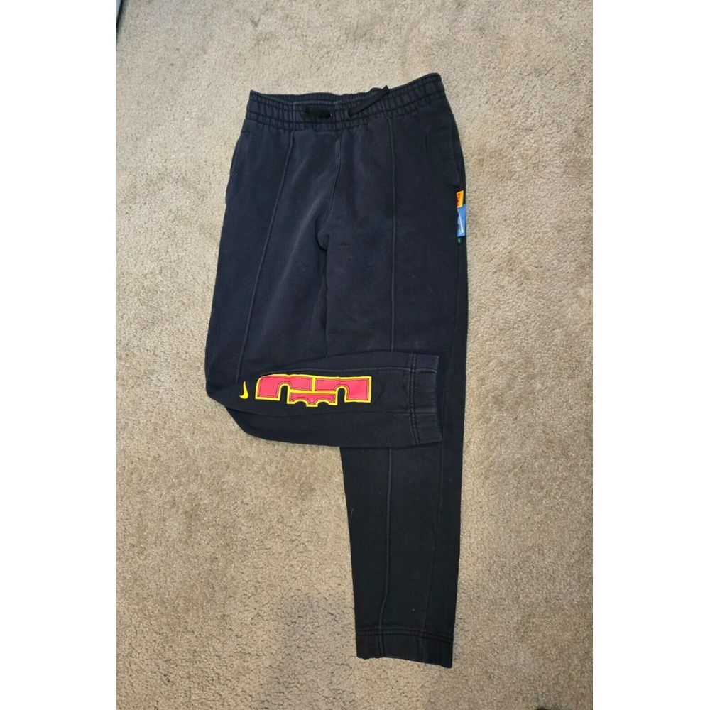 Nike Black Kids Sweatpants with Red and Yellow Logo